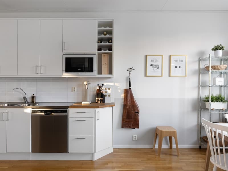 Professional cleaning service - pristine kitchen with modern appliances and spotless countertops